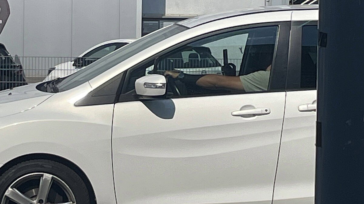 Autofahrer am Handy