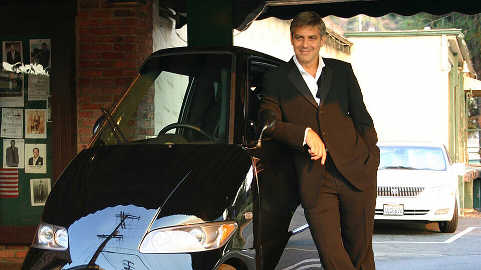 George Clooney mit dem Commuter Cars Tango T600