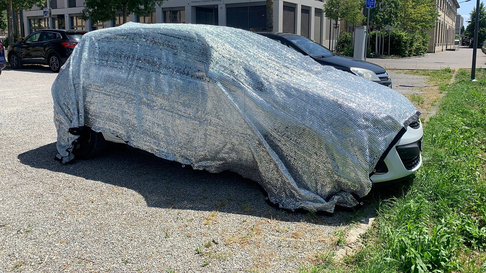 Hitze Schutzhülle über Auto